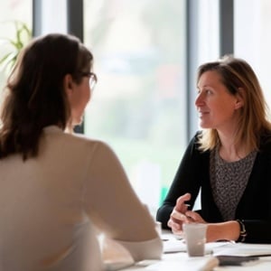 coaching someone life coaching comfortable two people at table-1-1